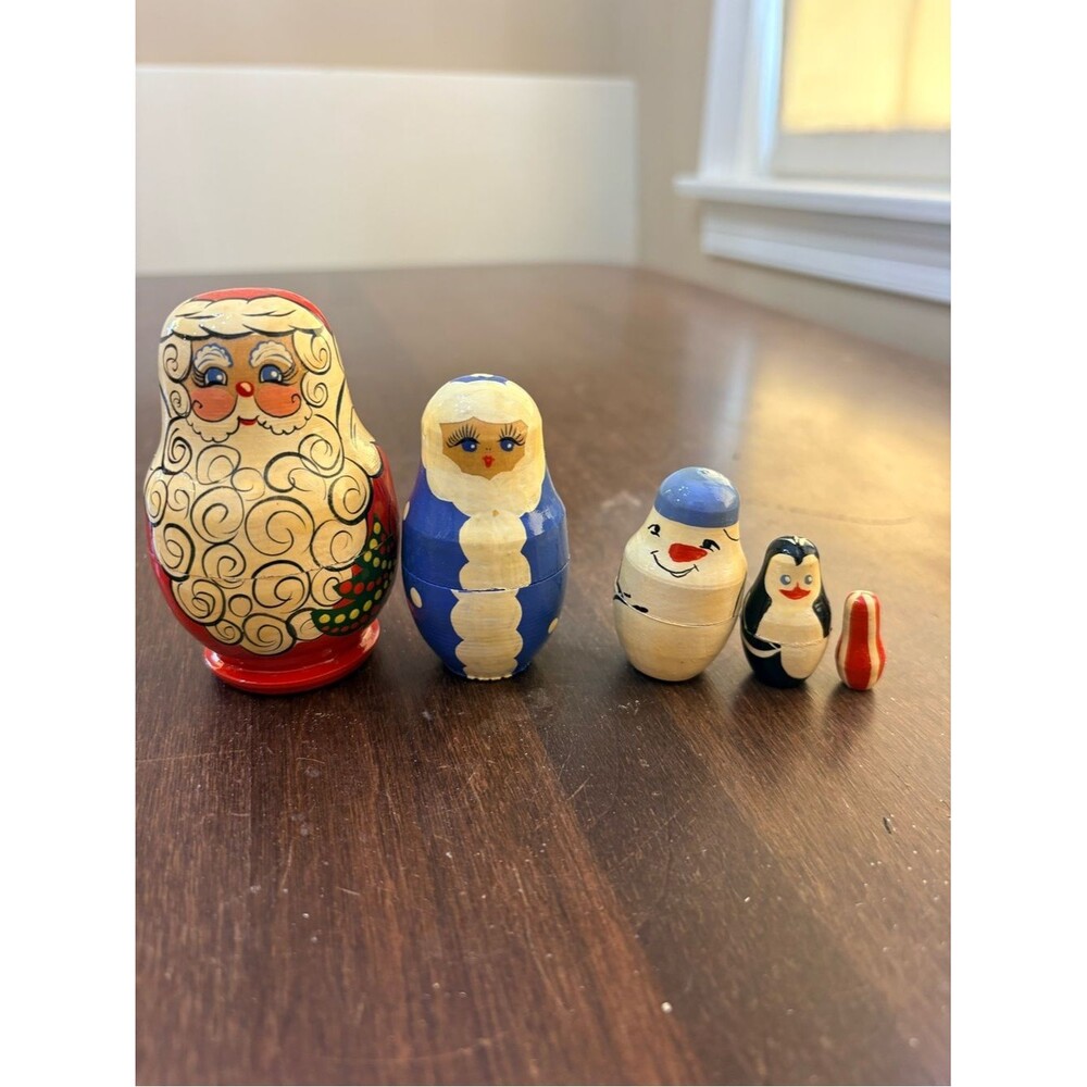 Charming hand-painted wooden Christmas nesting dolls